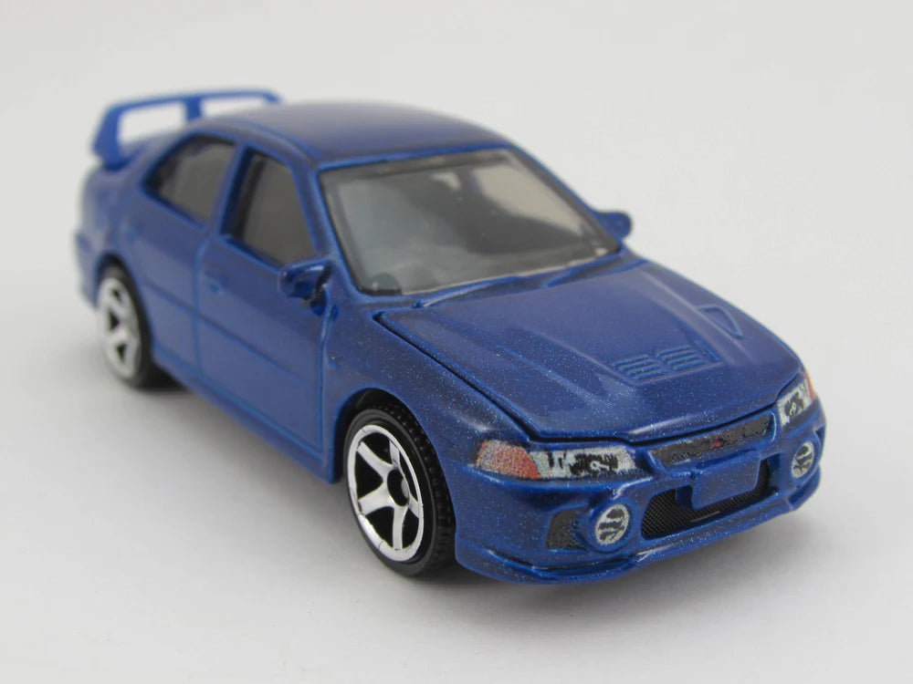 Matchbox 2023 Moving Parts 1996 Mitsubishi Lancer EVO IV, NEW/LOOSE, blue