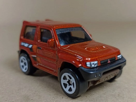 Hot Wheels 2024 #169/250 Pajero Evolution, NEW/LOOSE, burnt orange