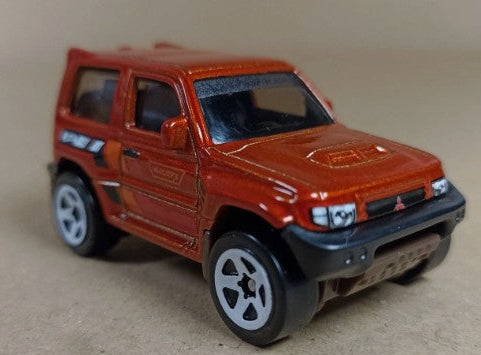 Hot Wheels 2024 #169/250 Pajero Evolution, NEW/LOOSE, burnt orange
