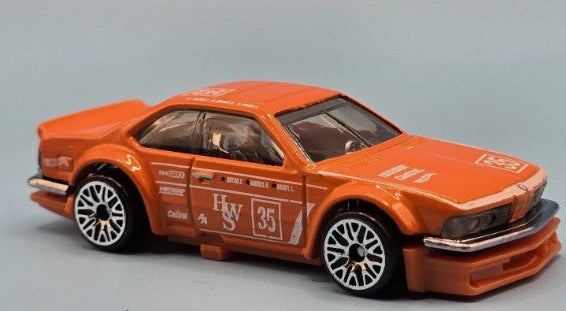 Hot Wheels 2025 #185/250 BMW 635 CSi, NEW/LOOSE, orange