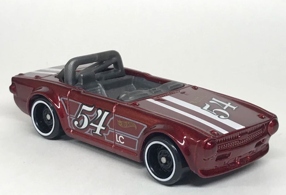 Hot Wheels 2021 #009/250 Triumph TR6, NEW/LOOSE, metalflake dark red