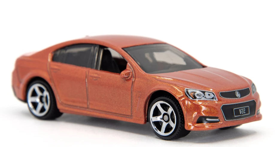 Matchbox 2024 #068/100 Holden VF Commodore SSV, NEW/LOOSE, orange
