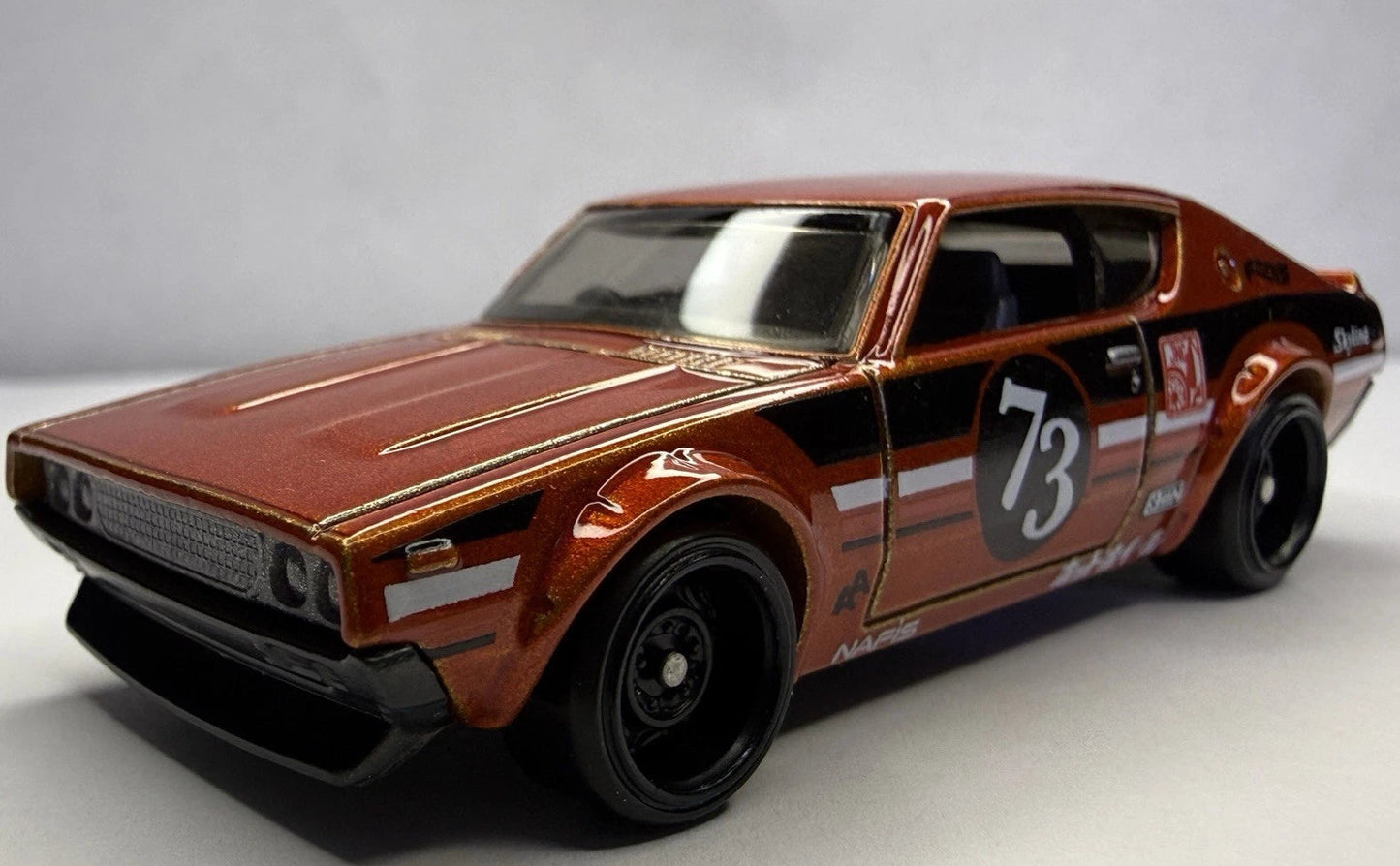 Hot Wheels 2026 #088/250, Nissan Skyline 2000 GT-R, NEW/LOOSE, burnt orange