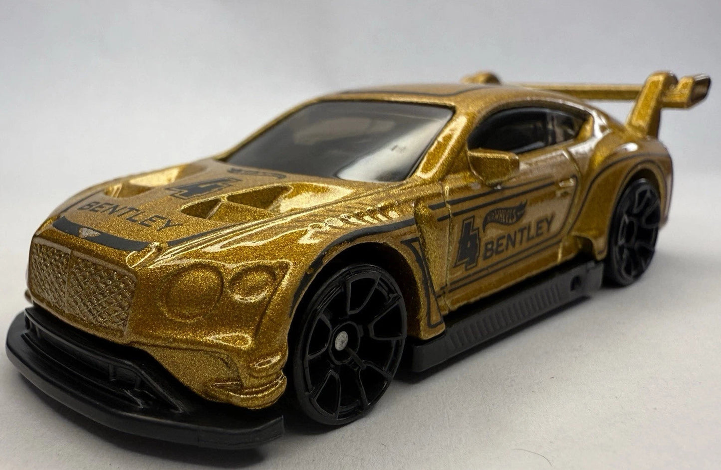Hot Wheels 2025 #162/250 2018 Bentley Continental GT3, NEW/LOOSE, gold
