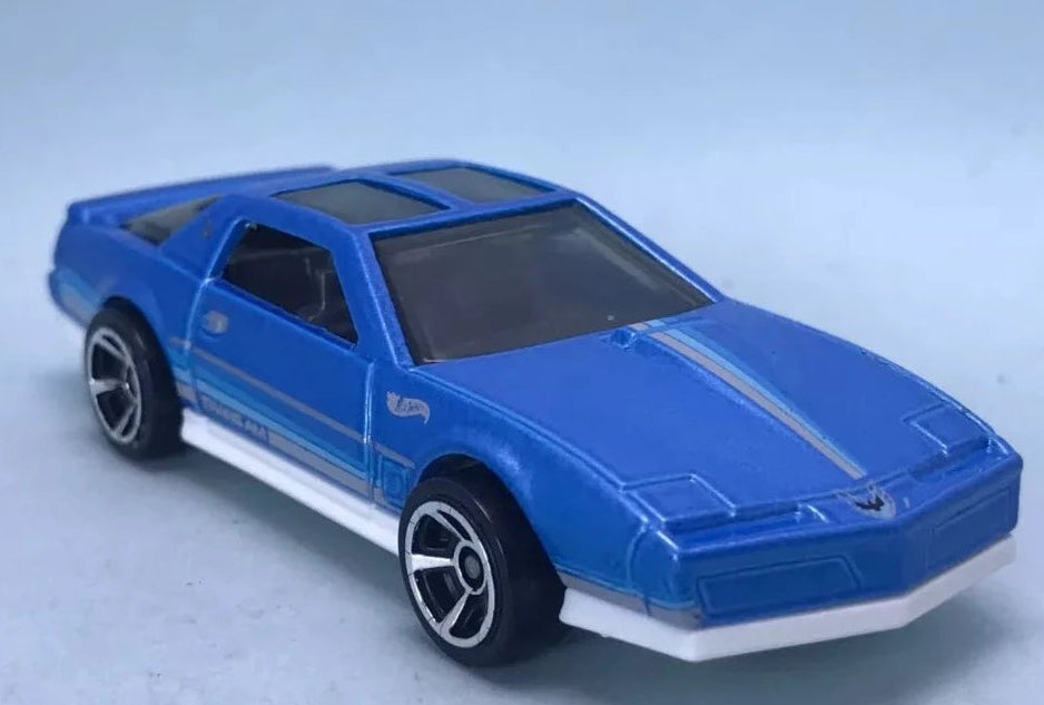 Hot Wheels 2023 #180/250 '84 Pontiac Firebird, NEW/LOOSE, metalflake light blue