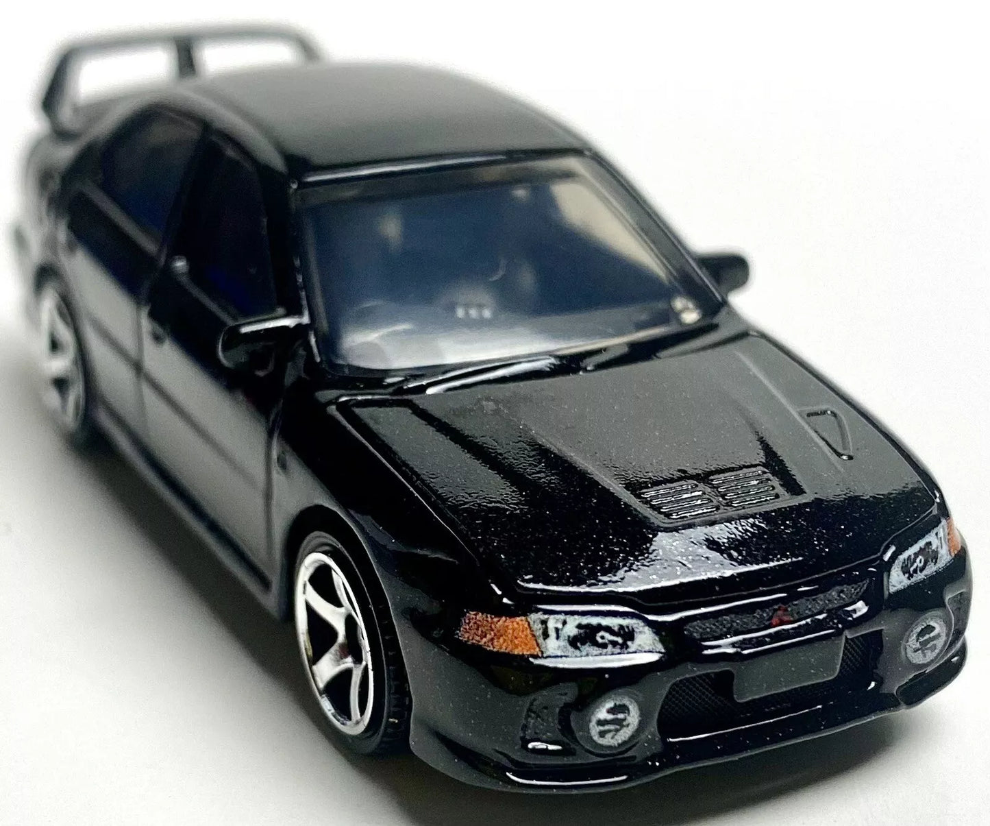 Matchbox 2024 Moving Parts 1996 Mitsubishi Lancer EVO IV, NEW/LOOSE, black