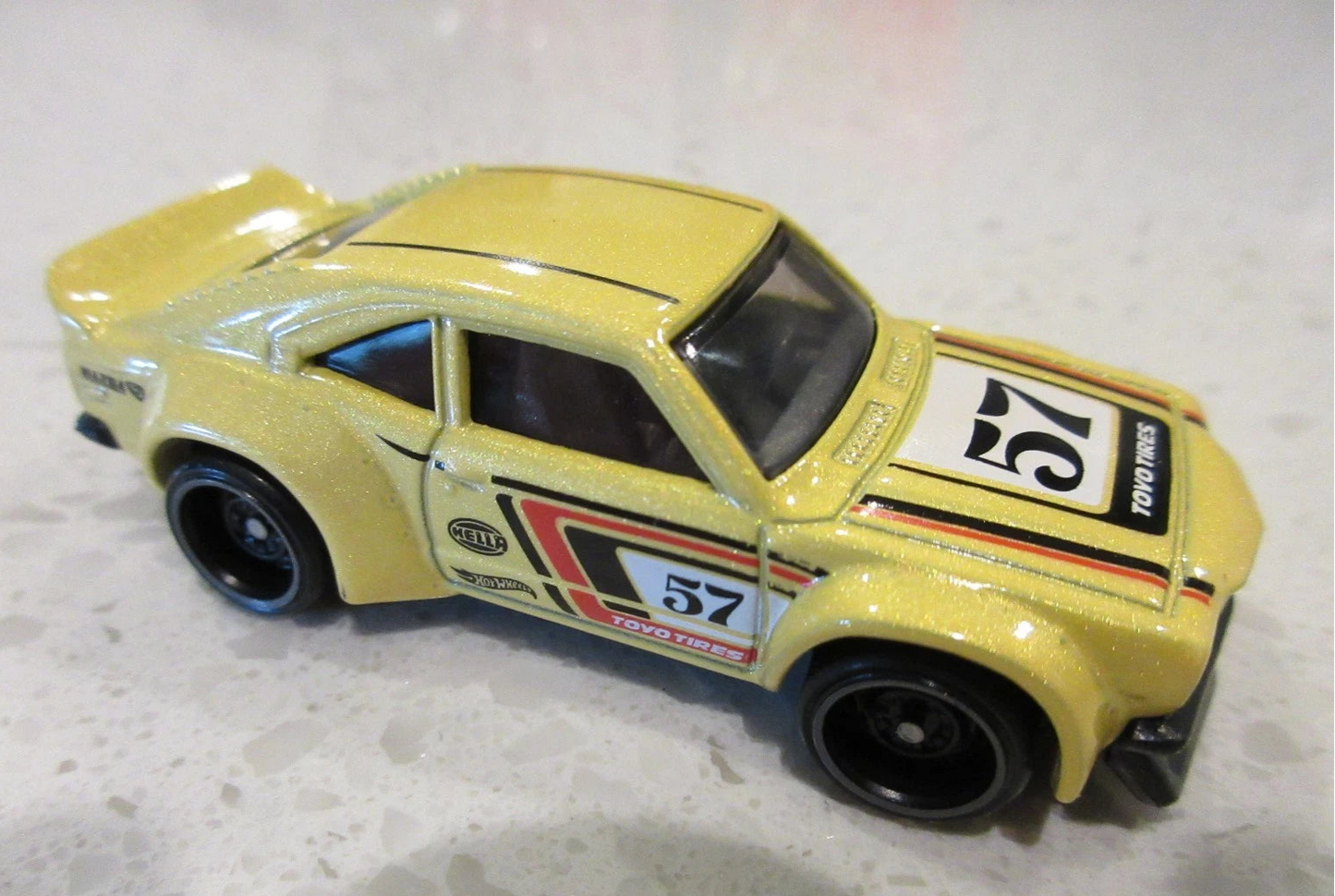 Hot Wheels 2025 #243/250 Mazda RX-3, NEW/LOOSE, yellow