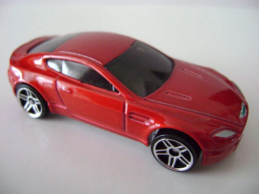 Hot Wheels 2007 #092/180 Aston Martin V8 Vantage, NEW/FACTORY FLAWED/LOOSE, metallic red