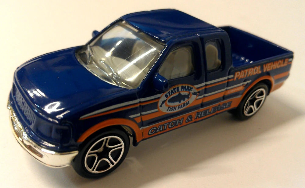 Matchbox 1999 #069/100, 97 Ford F 150, PREOWNED/LOOSE, navy blue