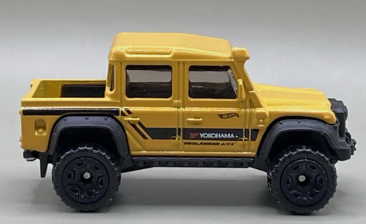 Hot Wheels 2025 #179/250, '15 Land Rover Defender Double Cab, NEW/LOOSE, yellow