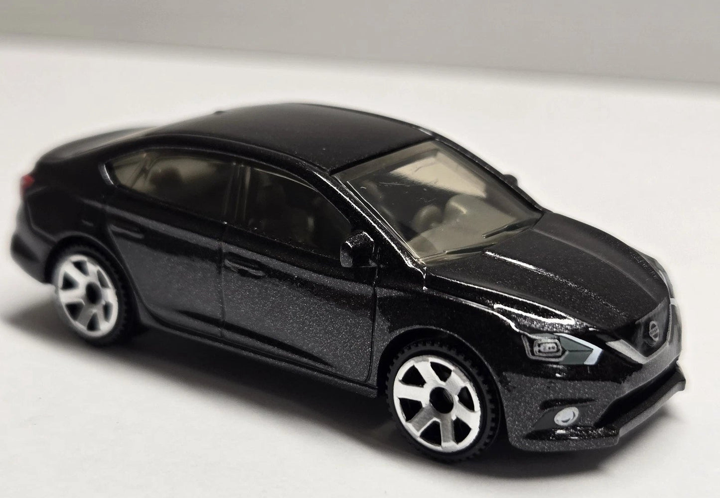 Matchbox 2025 #091/125, 2016 Nissan Sentra, NEW/LOOSE, black