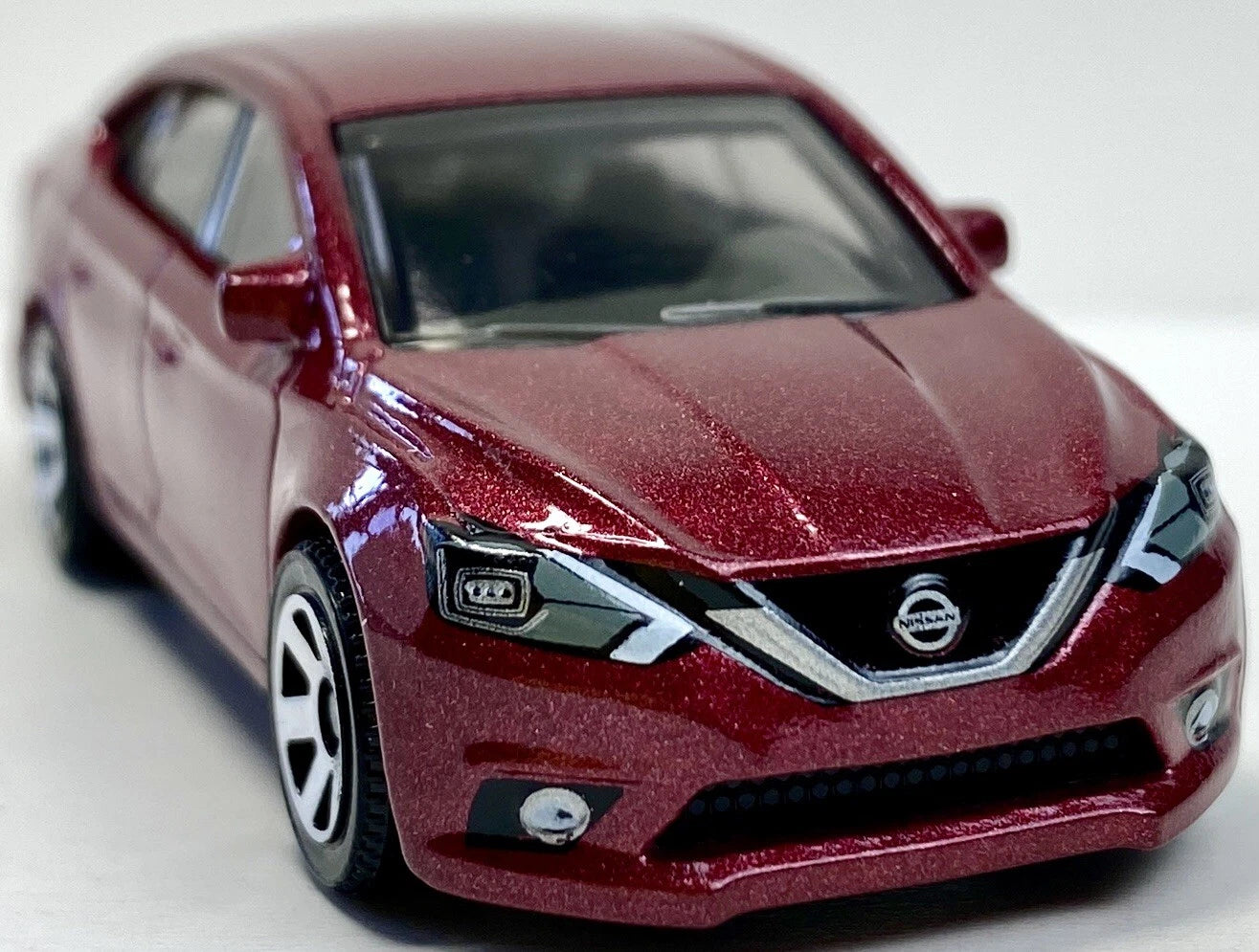 Matchbox 2024 #009/100, 2016 Nissan Sentra, NEW/LOOSE, metalflake red